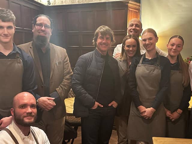 Tom Cruise stands beside staff at Restaurant Lovage in Bakewell, Derbyshire, after dining there on March 5, 2024.  Picture: Restaurant Lovage / SWNS