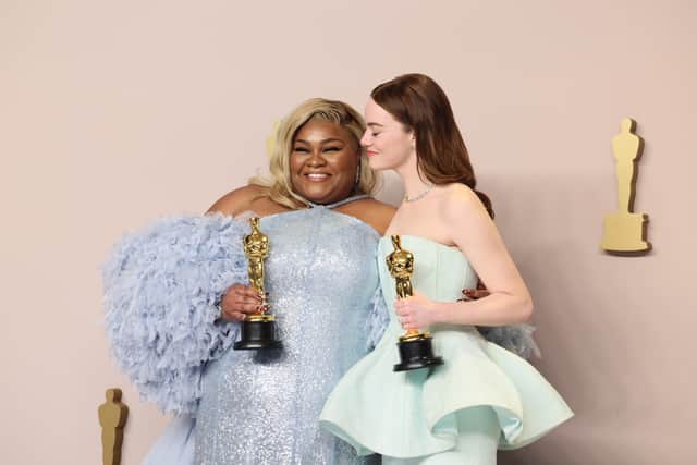  (L-R) Da'Vine Joy Randolph, winner of the Best Supporting Actress award for "The Holdovers," and Emma Stone, winner of the Best Actress in a Leading Role award for Poor Things," pose in the press room during the 96th Annual Academy Awards at Ovation Hollywood on March 10, 2024 in Hollywood, California. (Photo by Rodin Eckenroth/Getty Images)