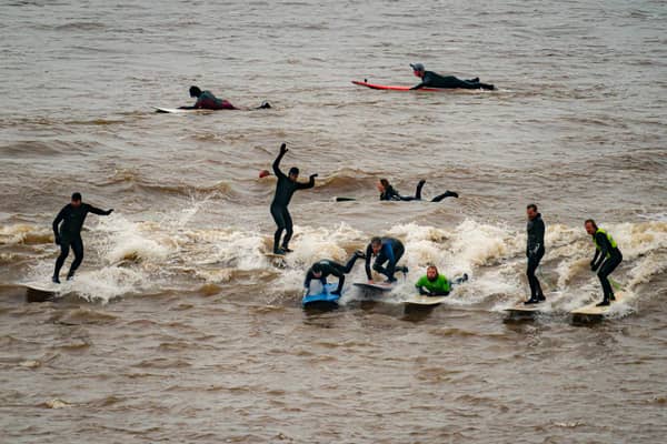 Surfers have flocked to Gloucestershire to ride the first five-star Severn Bore since March 2019. (Photo: Ben Birchall/PA Wire)