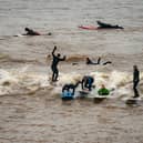 Surfers have flocked to Gloucestershire to ride the first five-star Severn Bore since March 2019. (Photo: Ben Birchall/PA Wire)