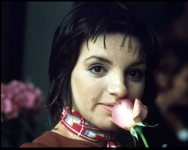 Performer Liza Minnelli Smells A Rose. Minnelli Is In An Elite Group Of Artists To Have Achieved The "Quadruple Crown" Of Entertainment Honors Having Won Three Tony Awards, An Oscar, Two Golden Globe Awards And An Emmy.  (Photo By Getty Images)