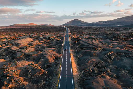 Aerial view of straight road among volcanic landscape. Lanzarote, Spain. Picture: Getty