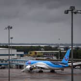 Armed police boarded a TUI flight at Manchester Airport moments after it touched down on the runway and arrested a man. (Photo: AFP via Getty Images)