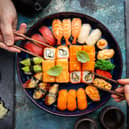 An influencer has claimed that a sushi restaurant gave a woman in his group smaller portions of food than the men, but still charged her the same price for her meal. Stock image by Adobe Photos.