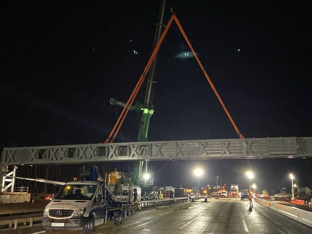 The new gantry being installed on the M25 between Junctions 10 and 11 in Surrey. Picture released March 17, 2024 Picture: National Highways