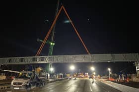 The new gantry being installed on the M25 between Junctions 10 and 11 in Surrey. Picture released March 17, 2024 Picture: National Highways