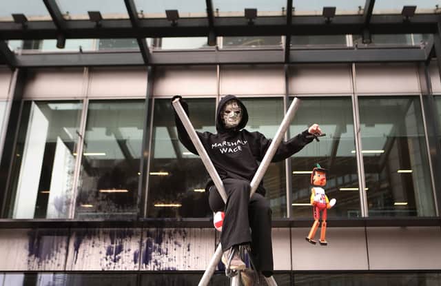 Extinction Rebellion protesters outside GB News studios at The Point, in Paddington, London, after they spray painted the building (Photo: Philip Toscano/PA Wire)