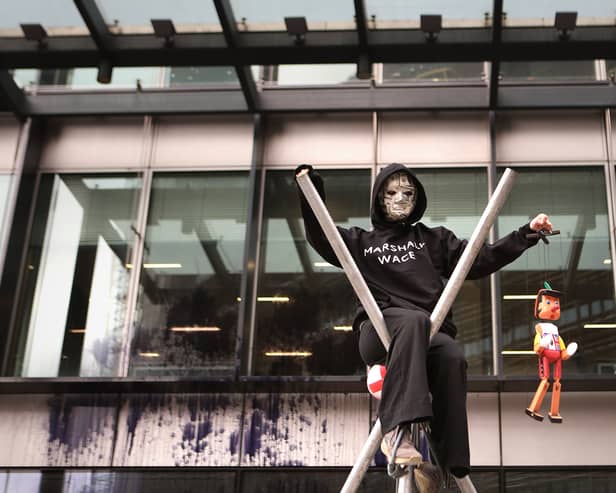 Extinction Rebellion protesters outside GB News studios at The Point, in Paddington, London, after they spray painted the building (Photo: Philip Toscano/PA Wire)