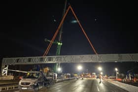 The M25 has reopened eight hours earlier than planned after the first ever daytime closure of the busy motorway to demolish a bridge and install a new gantry. (Credit: National Highways: South-East/PA Wire)