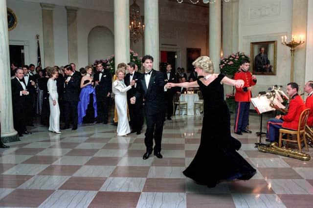 The late Princess Diana danced with John Travolta in Cross Hall at the White House during an official dinner on November 9, 1985 in Washington, DC.
