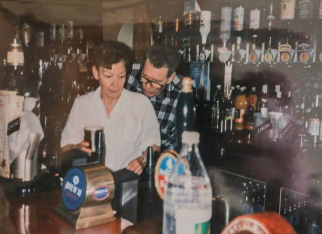 Ann Wilson and her husband Leslie (Les) at the pub in the 1980s. Picture: Courtesy Ann Wilson / SWNS