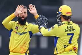 Moeen Ali celebrates with CSK captain MS Dhoni (R) in 2023 tournament