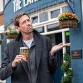Former England footballer Peter Crouch has launched a promotion in Greene King pubs which will see 100,000 free pints on offer if it rains in Manchester next week Picture: Greene King