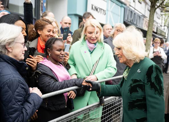 BELFAST, NORTHERN IRELAND - MARCH 21: Queen Camilla meets well wishers after visiting Knotts bakery on March 21, 2024 in Belfast, Northern Ireland.  (Photo by Samir Hussein - Pool/Getty Images)