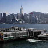A general view of the Hong Kong skyline from the kowloon district of Hong Kong on February 2, 2023. - Hong Kong is ready to welcome the world back, its US-sanctioned leader told business and tourism heavyweights on February 2 as he pitched free flights and positive publicity to resurrect the once-vibrant global hub. (Photo by ISAAC LAWRENCE / AFP)