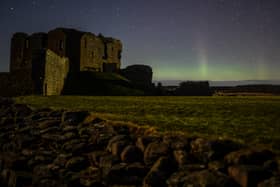 The Aurora Borealis is seen above the ruins of Duffus Castle in Scotland in February 2021 (Photo: Peter Summers/Getty Images)