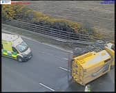 An overturned road sweeper is causing long delays on the M3