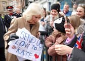 Queen Camilla receives a message of support for the Princess of Wales from well-wishers during a visit to the Farmers' Market in The Square, Shrewsbury, in Shropshire. Picture: Chris Jackson/PA Wire