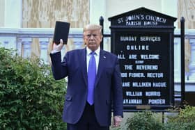 Then US President Donald Trump holds up a Bible outside of St John's Episcopal church in Washington, DC in 2020 (Photo: BRENDAN SMIALOWSKI/AFP via Getty Images)
