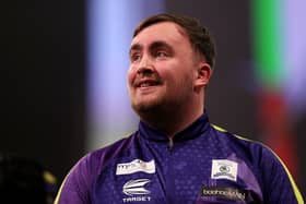 Darts star Luke Littler gave a brilliant five-word dig at Premier League striker Neal Maupay. Picture: Getty Images
