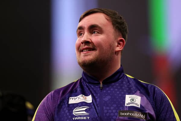 Darts star Luke Littler gave a brilliant five-word dig at Premier League striker Neal Maupay. Picture: Getty Images