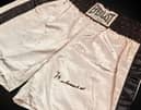 Shorts worn by Muhammed Ali in the Thrilla in Manila boxing match against Joe Frazier are going up for auction. Picture: Sotheby's / SWNS