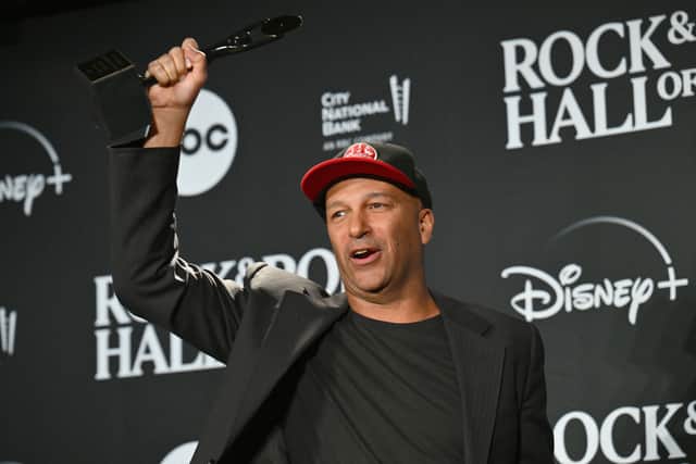 Inductee US guitarist Tom Morello of "Rage Against The Machine" poses in the press room during the 38th Annual Rock & Roll Hall of Fame Induction Ceremony at Barclays Center in the Brooklyn borough of New York City on November 3, 2023. (Photo by ANGELA WEISS / AFP) 