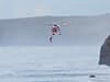 Video: Dog walker rescued by RNLI and helicopter airlift mission after falling into the sea