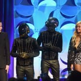 (L-R) Jack White, Daft Punk, and Beyonce onstage at the Tidal launch event #TIDALforALL at Skylight at Moynihan Station on March 30, 2015 in New York City.  (Photo by Jamie McCarthy/Getty Images for R