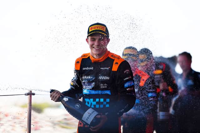 Oscar Piastri celebrates third place in the Japanese Grand Prix 2023