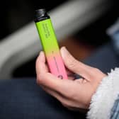 Two women charged after videos of toddler vaping posted on social media