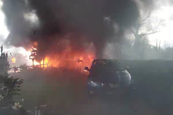 Ambulance bursts into flames. Picture: David Brinklow / SWNS