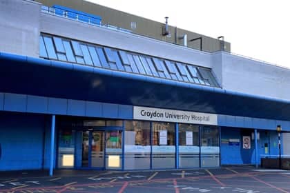A woman and two police officers were taken to Croydon University Hospital after exposure to 'hazardous substance' 