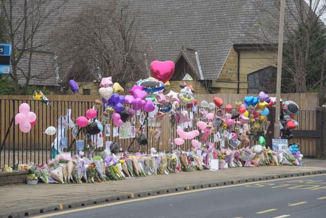 Hundreds of tributes left at the scene. Picture: Alex Cousins SWNS.com