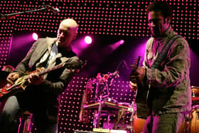  Innocent Criminal guitarist Michael Ward and Ben Harper perform during the KCRW Sounds Eclectic Evening at Gibson Amphiteatre at Universal CityWalk on March 25, 2006 in Los Angeles, California.  (Photo by Karl Walter/Getty Images)