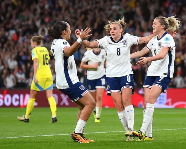 Lauren James and Georgia Stanway celebrate England's opening goal with goalscorer Alessia Russo. Cr. Getty Images.