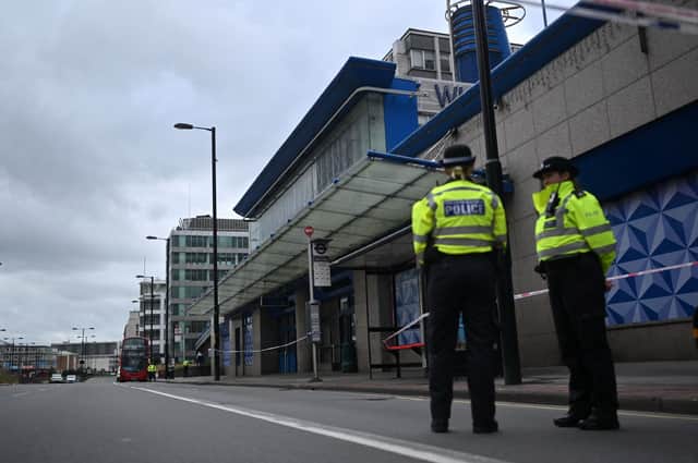 Police officers stand on duty in Croydon in September 2023 (Photo: JUSTIN TALLIS/AFP via Getty Images)