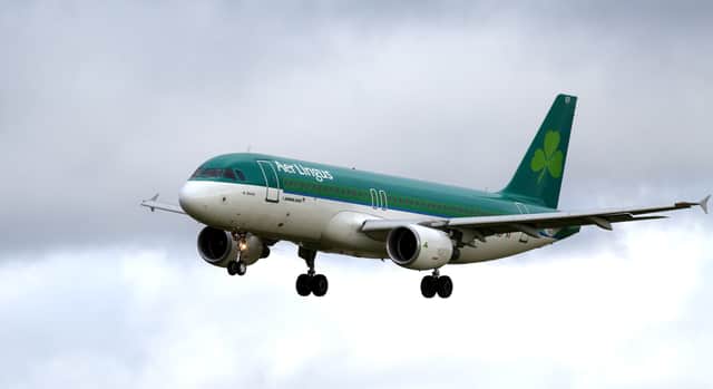 An Aer Lingus flight attempting to land at Dublin Airport made a dramatic go-around after it landed sideways amid high winds brought by Storm Kathleen. (Photo: AFP via Getty Images)