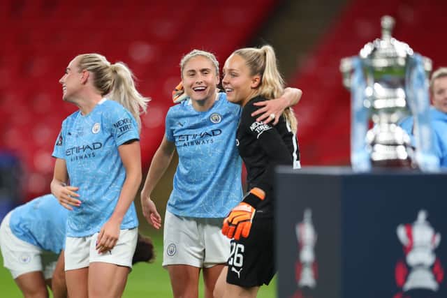 Roebuck and 'superhero' team mate Steph Houghton. Cr. Getty Images.