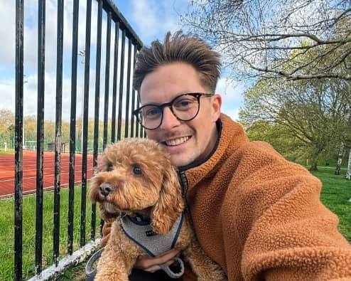Doctor Alex George with his dog, Rolo. He has posted this photo on Instagram after being discharged from hospital for the second time in just a few days. Photo by Instagram/dralexgeorge.