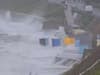 Video: Beach huts blow into the sea during Storm Pierrick as Met Office issue yellow weather warning