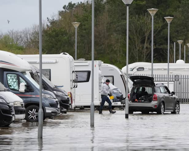 One person was hospitalised amid flooding at a holiday park in West Sussex after River Arun burst its banks in the midst of high winds and heavy rain. (Credit: Gareth Fuller/PA Wire )