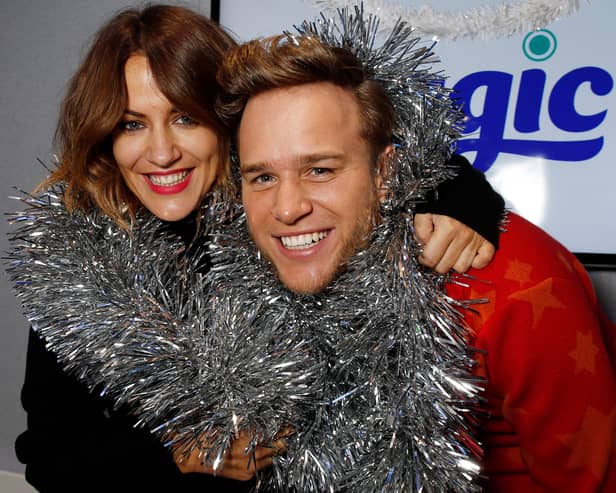 Caroline Flack and Olly Murrs pictured during a visit to the Magic Radio Studios on November 27, 2014 in London, England. Photo by Alex Huckle/Getty Images) 