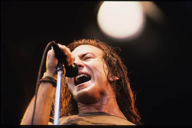 Pearl Jam lead singer Eddie Vedder performing at the Pinkpop Festival in Landgraaf, Netherlands during the 1996 festival (Credit: Gie Knaeps/Getty)