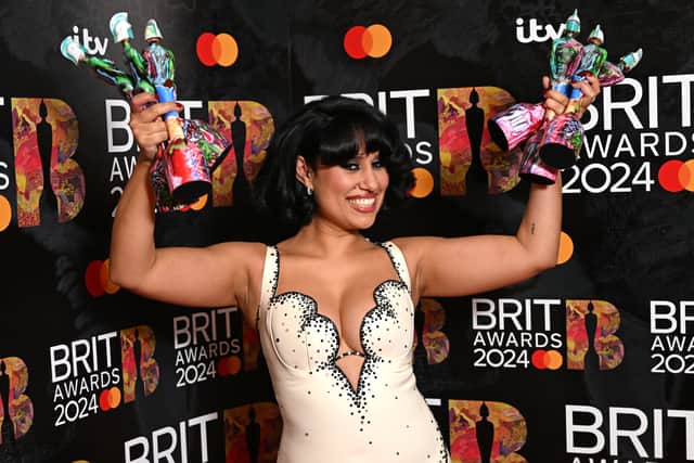 Raye poses with their Best New Artist, R&B Act, Song of the Year, Artist of the Year, Album of the Year and Songwriter of the Year award in the winners room at the BRIT Awards 2024 at The O2 Arena on March 02, 2024 in London, England. (Photo by Kate Green/Getty Images)