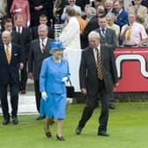 Derek Underwood walking alongside the late Queen during 2nd Ashes Test Match between England and Australia at Lord's on July 17, 2009 in London, England. 