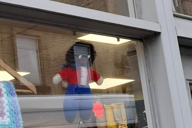 Charity shop Preloved in Skipton, North Yorkshire has come under for displaying a golly doll in the window