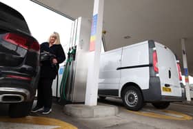 A motorist refuels their diesel car at a Tesco petrol station (Photo: ADRIAN DENNIS/AFP via Getty Images)