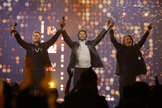 Take That perform onstage during the finale of The National Lottery's Big Bash to celebrate 2023 at OVO Arena Wembley on December 06, 2023 in London, England. Coming to ITV1 and ITVX on 31st December  (Photo by John Phillips/Getty Images for The National Lottery)