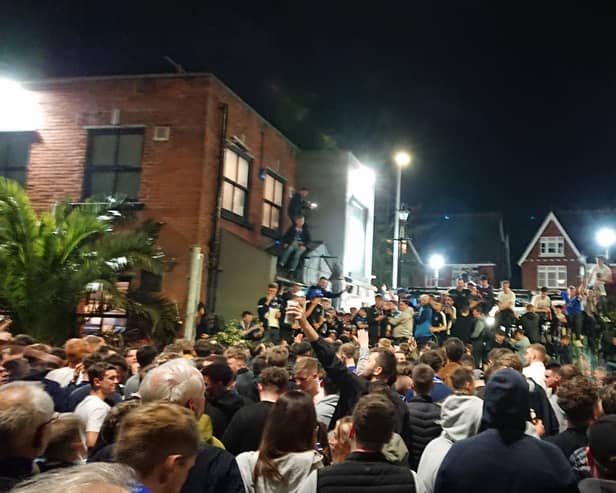 Fans outside O'Neills in Albert Road, Southsea, on April 16 celebrating Pompey's League One title win against Barnsley. Police said various incidents of disorder took place at the bar and elsewhere, including a staff member being racially abused.